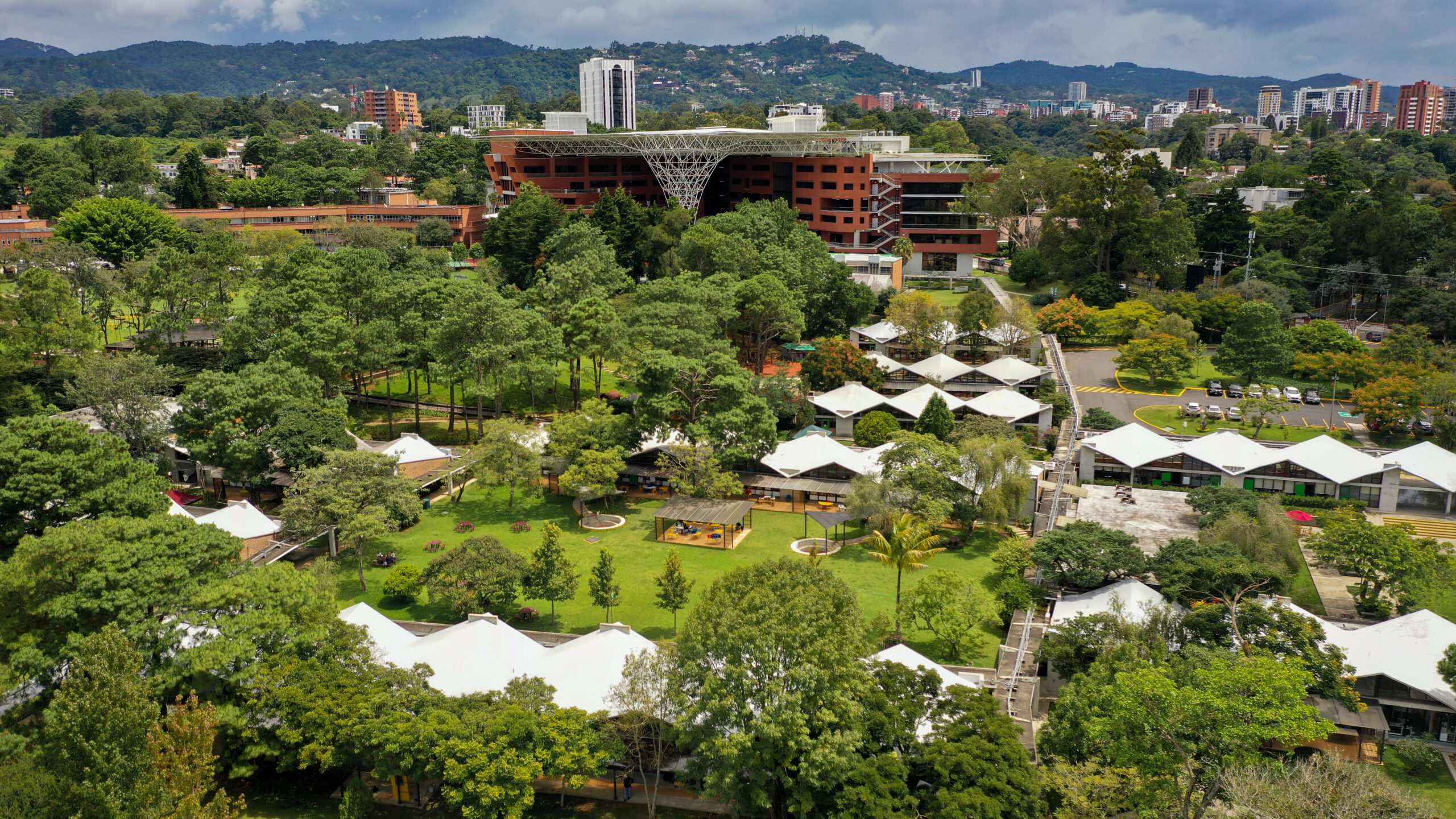 American School of Guatemala building surrounded by greenery