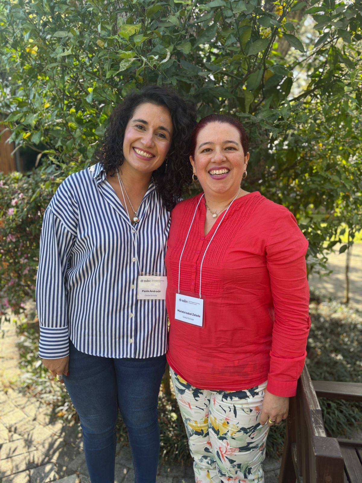 Glocal scholars, Mariela Isabel Zelada and Paola Andrade Calderon, smiling