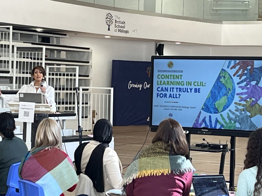 Woman presenting at an event.
