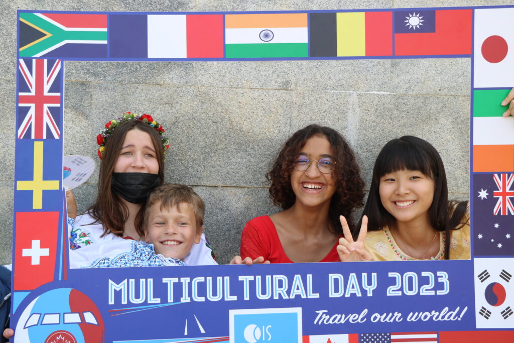 Students holding frame